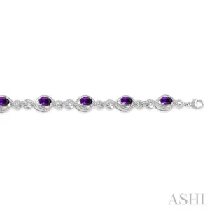 1/10 Ctw Round Cut Diamond & 7x5MM Oval Cut Amethyst Semi Precious Bracelet in Sterling Silver