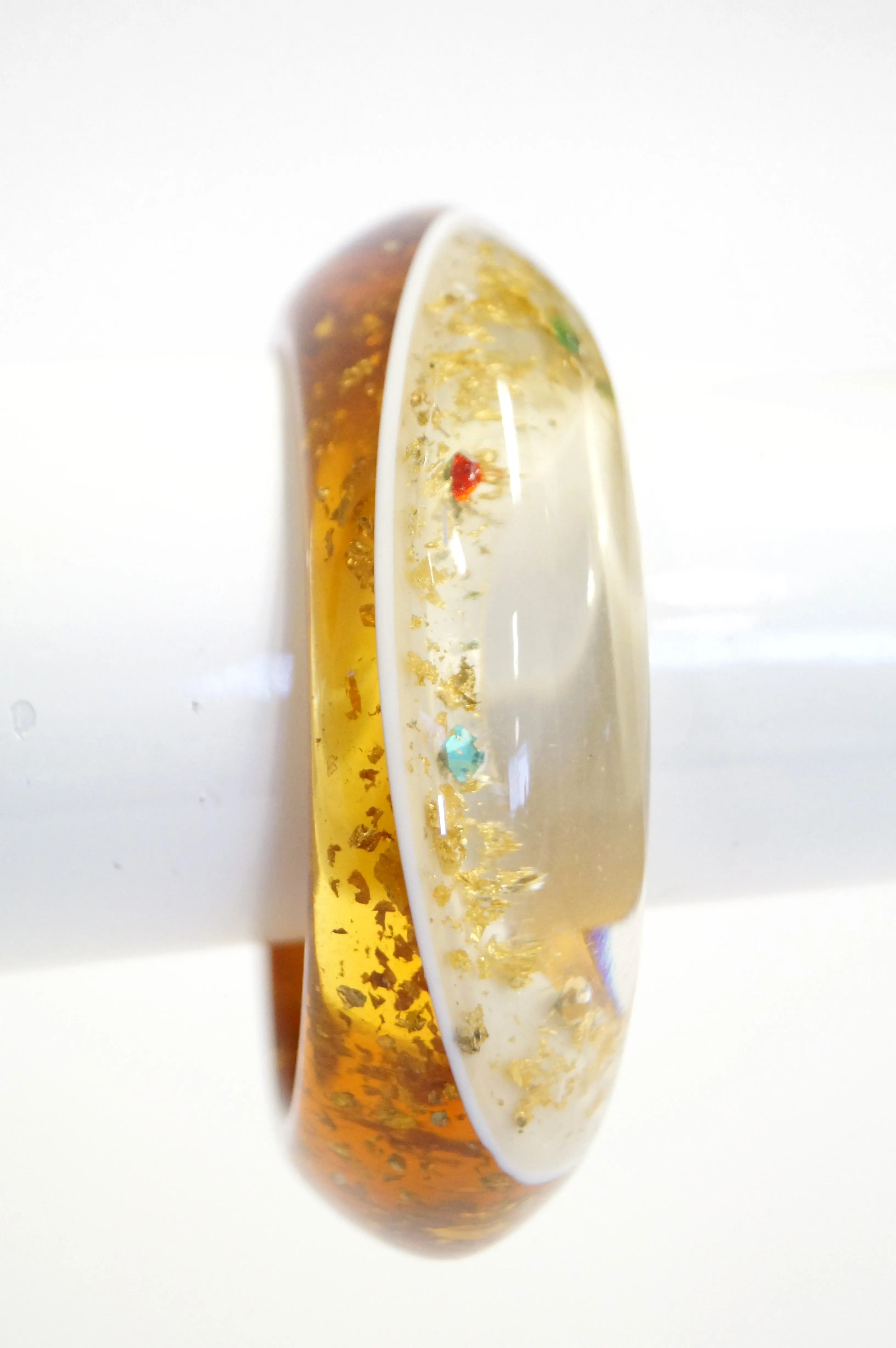 1950s Amber Lucite Bangle with Glitter and Rhinestone Inclusions