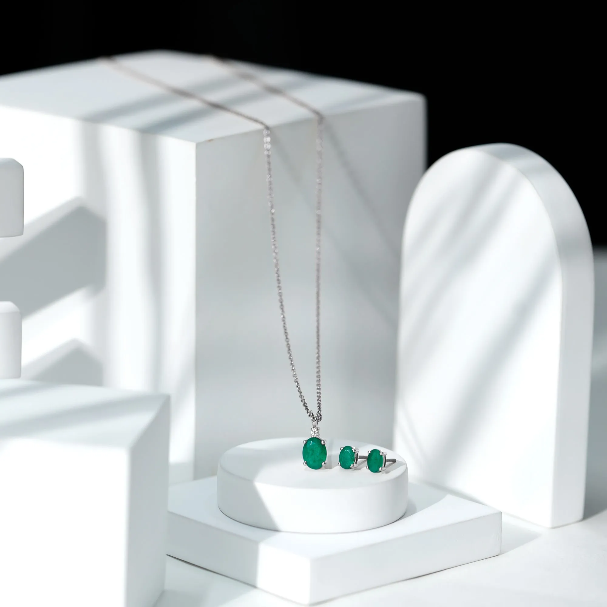 Oval Cut Emerald Solitaire Pendant and Earrings set with Moissanite