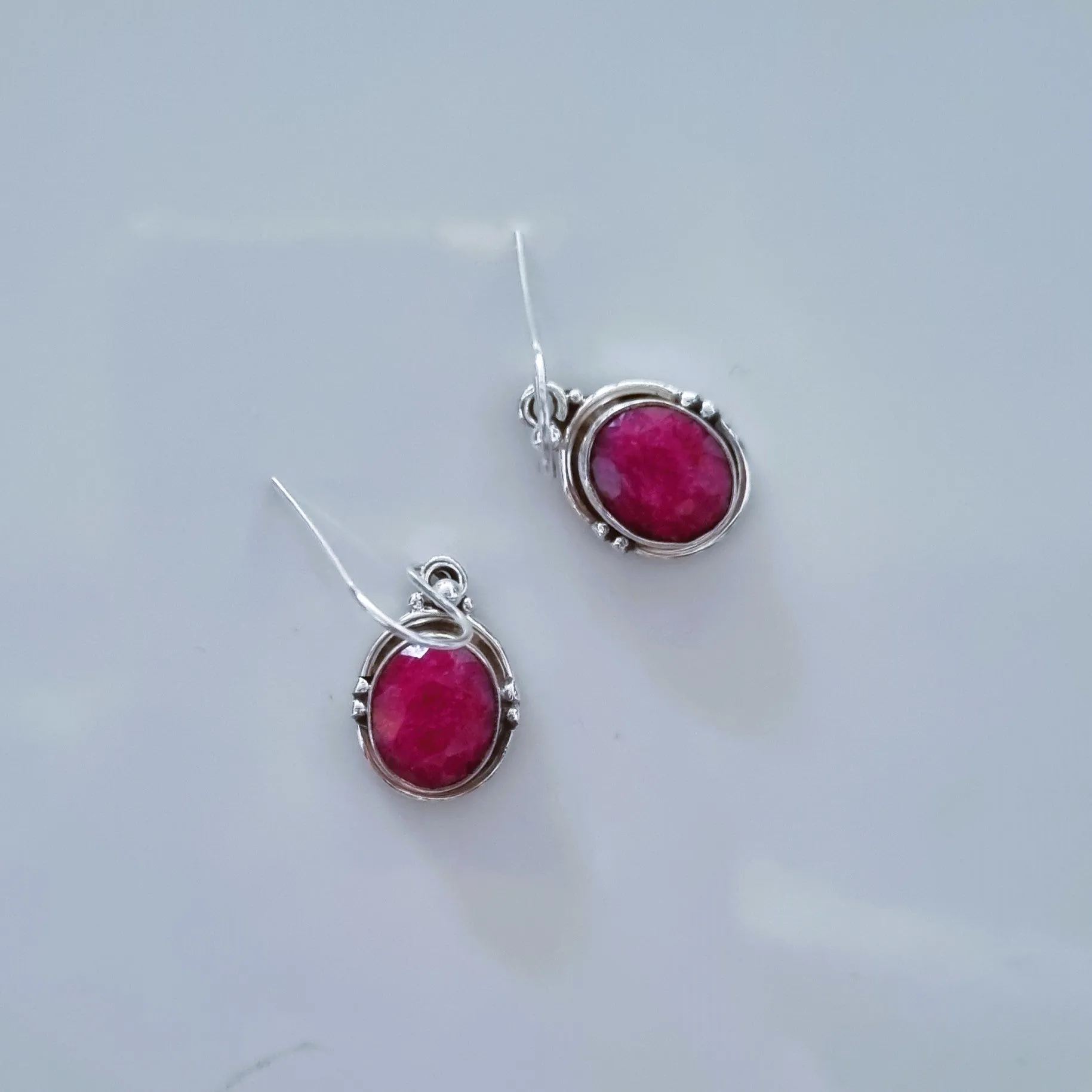 Oval ruby silver earrings
