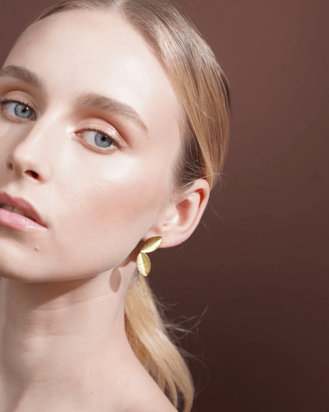 Two Golden Tiny Leaf Earrings